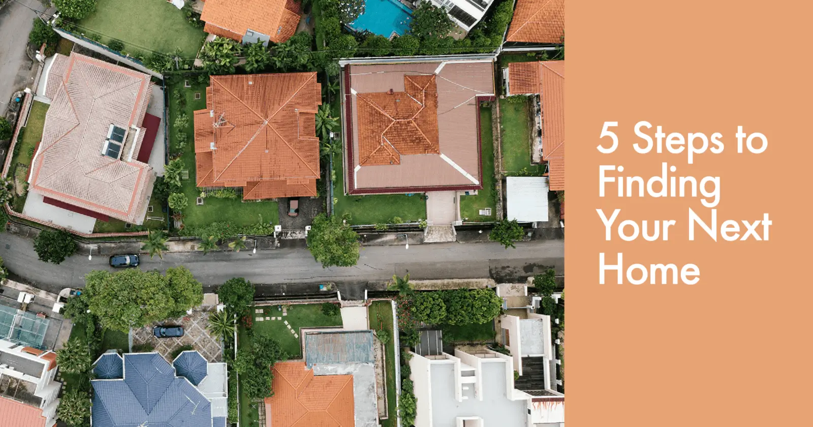 Aerial view of houses and a street.