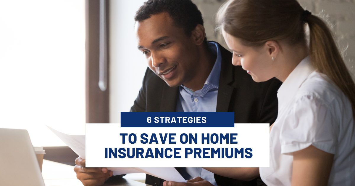 Two people reviewing home insurance strategies.